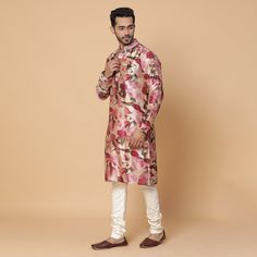 A cherry blossom silk kurta with anchoring detail on neck. Perfect fit for groomsmen or wedding guest. Delivery Period: 20 Days Floral Print Sherwani For Wedding And Eid, Designer Spring Wedding Kurta, Festive Floral Print Wedding Sherwani, Designer Spring Formal Kurta, Pink Kurta, Resham Embroidery, Shirt Jacket Men, Drape Saree, Silk Kurta