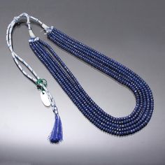 Product Details : ITEM : BLUE SAPPHIRE BEADED NECKLACEItem Code : DGC3714Gemstone Name :  BLUE SAPPHIRE ( GLASS FILLED)Chain Style : BEADEDBeads Shape : FACETED RONDELLEBeads Size : 4-5.5 mm Approx.Length : 16"-20" Inch Approx.Weight : 700 Cts. Approx.Customization : **Available**Please Feel Free To Contact If You Have Any Query. Blue Sapphire Beads Necklace Indian, Beeds Chain Designs, Emerald Jewellery, Blue Gemstone Necklace, Blue Jewellery, Blue Sapphire Jewelry, Sapphire Beads, Lucky Jewelry, Blue Sapphire Necklace