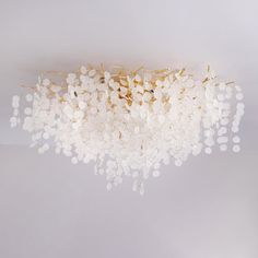 a white chandelier hanging from the ceiling