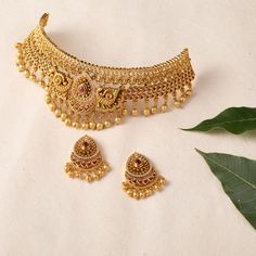 Shop Now: Tarinika's Temple Classic Antique Choker Set Choker Necklace Indian Antiques, Vintage Gold Necklace Indian, 5 Tola Gold Necklace Set Design, Indian Gold Jewelry Sets, Indian Jewelry Sets Bridal, Gold Set For Bride, Gold Jewellery Set Design Unique, 15 Gm Gold Necklace Design, Intricate Design Choker For Receptions And Festivals