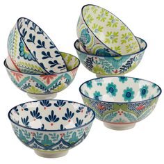 four bowls with different designs on them