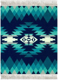 a blue and white blanket with an abstract design on the front, featuring two diamond shapes