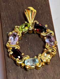 Multi Stone Sterling Pendant Garnet Amethyst Blue Topaz Citrine Peridot Wreath Circle 925 Silver Vintage Jewelry Christmas Birthday Gift https://www.etsy.com/listing/1591684248/multi-stone-sterling-pendant-garnet Vintage Navajo Jewelry, Pet Pig, Real Gold Jewelry, Jewelry Christmas, Citrine Gemstone, Christmas Birthday Gifts, Topaz Gemstone, Multi Stone, Amethyst Gemstone