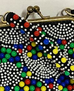 1950s Lovely colorful handbag Multi colored plastic beads on taffeta. Black taffeta lining Shes in nice condition! See photos Rectangular Retro Shoulder Bag For Vintage Events, Retro Rectangular Evening Bag For Vintage Fashion, Retro Black Bags For Vintage Events, Retro Clutch Bag For Vintage Events, Retro Clutch For Vintage Events, Retro Black Rectangular Evening Bag, Black Retro Rectangular Evening Bag, Retro Rectangular Evening Bag, Retro Pouch Coin Purse