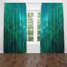 the curtains are open and ready to be hung in front of the window with an image of a peacock on it