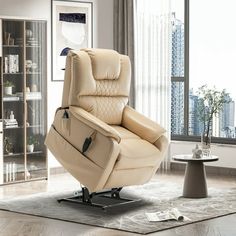 the recliner chair is in front of a large window with cityscape behind it