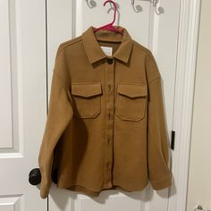 Very Soft Fabric Never Worn Been In The Closet For Years Beige Collared Utility Jacket For Fall, Khaki Long Sleeve Shacket For Fall, Camel Winter Outerwear With Pockets, Spring Camel Outerwear With Pockets, Beige Utility Jacket With Button Closure For Fall, Winter Khaki Collared Shacket, Neutral Button-up Outerwear For Fall, Khaki Collared Shacket For Winter, Collared Khaki Shacket For Winter