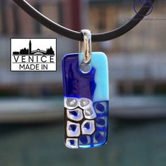 This pendant was created by our artist in the island of Murano using the fused technique with Murrina blue. The combination of style and design is the perfect feature of this glass art work. Delivery made with gift box and warranty card. - All our items come with a Made in Murano Warranty Certificate. - Dimensions: Height 1 cm (inches 0,39) Length 4 cm (inches 1,57) Weight 20 grams Adjustable Murano Glass Jewelry For Gifts, Elegant Murano Glass Necklace For Gift, Glass Art Work, Murano Glass Pendant Necklace For Gift, Silver Murano Glass Jewelry Gift, Nickel-free Murano Glass Jewelry For Gifts, Gifts Jewelry, Blue Pendant, Romantic Gifts