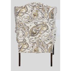 an upholstered chair with paisley print on it