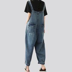 Make a fashionable statement this Spring-Summer with our vintage women's jean jumpsuit! This stylishly baggy jumpsuit features suspenders closure and a unique design that will make you stand out from the crowd. With its cool vintage look. you can be sure you'll be looking both fashionable and comfortable!Distinctive Features: Fashionable Vintage Look: This jumpsuit features a unique vintage style that will make you look good while staying comfortable. Baggy Design: The baggy design allows for co Trendy High-waist Jumpsuits And Rompers With Suspenders, Denim Jumpsuits And Rompers With Suspenders, Trendy Denim Overall Jumpsuit With Suspenders, Casual Cotton Jeans With Suspenders, Summer Wide Leg Medium Wash Denim Jumpsuit, Spring Denim Blue Overalls With Suspenders, Spring Medium Wash Denim Jumpsuit With Suspenders, Summer Dark Wash Wide-leg Denim Jumpsuit, Trendy Denim Jumpsuits And Rompers With Suspenders