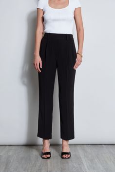 Designed with crisp pleats and a flattering mid-rise silhouette, our straight cut pant will instantly elevate your wardrobe. Effortless & ultra-chic, we love the look and feel of these crepe pleated pants. Pleated Straight Leg Pant 100% Polyester Runs true to size. Model is 5'9" and wearing size XS Measurements: Rise 11.5", Inseam 28.5" (approx. measurements for size Small) Dry Clean Only Imported Style #: ETR41302 Black Non-stretch Straight Leg Dress Pants, Black Pleated Full-length Pants, Black Straight Leg Pull-on Bottoms, Black Straight Leg Pull-on Pants, Pull-on Straight Leg Elastane Pants, Straight Cut Pants, Elie Tahari, Pleated Pants, Straight Cut