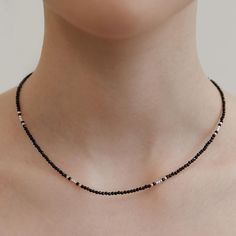 Black Beaded Necklace,Silver Beaded Satellite Layering Necklace,Dainty Boho Jewelry,Minimalist Handmade Jewelry,Gift for Her (NZ2436) ▶ Product Info. - Material: Brass / Beads / Cubic Zirconia  - Metal Finish: Silver + Anti-Tarnish E-Coat  - Safety: Nickle & Lead free and Haypoallergenic - Length: 40cm + 5cm (length adjustable) - Weight: 3.60g - TATIANA logo tag was added. - Made In South Korea Our jewelry was plated with a high-content gold/silver layer to minimize the discoloration, compared to regular non-plating one. ▶ Shipping and Return Policies Order today to get by  Date (14days) Return & exchanges accepted within 30days Cost to ship : USD 7.00 ▶ Cancellations Cancellations : accepted Request a cancellation : before item has shipped. ▶ Care Tip - Avoid contact with perfumes, body o Black Beaded Necklace, Brass Beads, Jewelry Minimalist, Black Bead Necklace, Handmade Jewelry Gift, Logo Tag, Layering Necklace, Necklace Dainty, Jewelry Cleaner