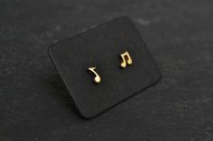 Tiny Music Note Earrings, Music Musician Note Jewelry, Children's Kid's Jewelry, 14K Solid Gold Everyday Earrings This is a pair of a tiny note stud earrings in 14K solid gold. Totally cute tiny earrings for a funky style! Also a nice thoughtful and super music lover gift! Measurements approx.: 3x4mm and 2x5mm. Also check more --Earrings-- http://www.etsy.com/shop/HardResols?section_id=11614037 And my shop here: http://www.etsy.com/shop/HardResols >----REGISTERED MAIL WITH TRACKING NUMBER---& Music Note Earrings, Funky Style, Tiny Earrings, Music Note, Gift For Music Lover, Funky Fashion, Everyday Earrings, Kids Jewelry, Music Notes