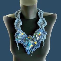 Introducing our Artisanal Elegance Handmade Necklace for women in denim blue. This unique accessory showcases the perfect balance of style and craftsmanship, making it a remarkable addition to any jewelry collection. Handcrafted with meticulous care, this exquisite crochet necklace features a denim blue foundation, intertwined with subtle hints of blue, turquoise green, and yellow nuances. The result is a captivating interplay of colors that is sure to catch the eye. Made from high-quality pure Blue Foundation, Eco Friendly Necklace, Crochet Unique, Vert Turquoise, Art Necklaces, Linen Yarn, Turquoise Green, Refashion Clothes, Green And Yellow