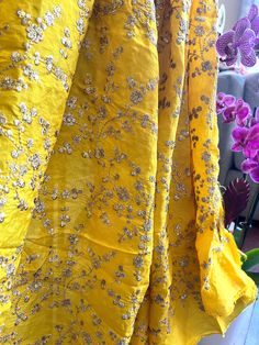 "Yellow Embroidered Banarasi Silk Fabric with Sequins Width: 36\" Banarasi Silk is a fine variant of Silk originating from the city of Varanasi in Uttar Pradesh, India. Banarasi silk have its roots seeped into the rich cultural history of India. Slight difference in color from visible product image is possible The Width of the fabric is 42 inches, Embroidery done on 36 inches of Fabric Suggested Care: Dry Cleaning is preferable. generally silk fabrics should be dry cleaned. In hand washing, the Designer Palazzo, Suit Dupatta, Dupatta Dress, Suit Indian, Stylish Mirror, Suit Embroidery, Saree Blouses Online, Peach Colour, Palazzo Suit