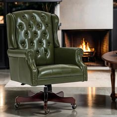 a green leather office chair sitting in front of a fire place with a wooden table