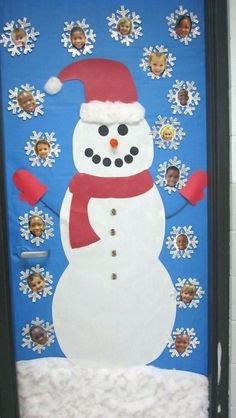 a door decorated with a snowman wearing a santa hat and scarf, surrounded by snowflakes