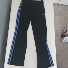 Black Adidas Track Pants With Blue Stripes On The Size. Very Warm And Feel Brand New, Only Worn A Few Times! Size:Small Waistband Has A String And Tie For Perfect Fit! Straight Leg Fit. Blue Adidas Track Pants, Adidas Track Pants, Track Pant, Adidas Track, Adidas Pants, Blue Adidas, Pants Color, Black Adidas, Adidas Women