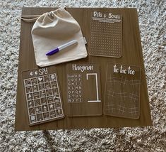 a table topped with lots of different items on top of a rug