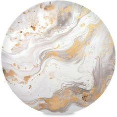 a white and gold marble plate on a white background with some brown speckles