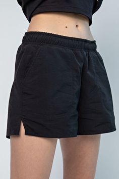 Take your activewear game to the next level with The Rae Taslan Shorts! Whether you're hitting the gym or just running errands, these shorts are perfect for any occasion. With a comfy elastic waistband, spacious pockets, and stylish side slits, you'll look and feel fabulous in the lightweight, breathable nylon fabric. So what are you waiting for? Slip into The Rae Taslan Shorts for an unbeatable look and a comfortable fit! High-waisted Relaxed Fit Athletic Shorts, High-waisted Relaxed Fit Athletic Shorts For Athleisure, Relaxed High-waisted Athletic Shorts For Athleisure, Athleisure High-waisted Athletic Shorts Relaxed Fit, Relaxed Fit Athletic Shorts With Built-in Shorts, Relaxed Fit High-waisted Shorts For Gym, Relaxed Fit High-waisted Workout Shorts, Relaxed Fit Running Shorts With Elastic Waistband, Relaxed Fit Athletic Shorts With Built-in Shorts For Workout