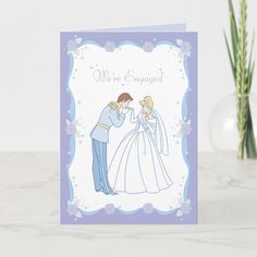 a wedding card with the words save the date on it, and a cartoon image of a bride and groom