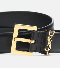 Saint Laurent's Cassandre belt will infuse your look with a high-fashion finish. The timeless design is crafted in Italy from black leather in a 30mm width and boasts gold-toned hardware, including an adjustable square buckle and the brand's unmistakable YSL signature loop..Material: calf leather.Made in Italy.Comes with dust bag.Width 3cm-1'.Buckle width 4cm-1.5' Classic Business Belt With Gold-tone Logo Plaque, Classic Belt With Gold-tone Logo Plaque For Business, Chic Black Belt With Gold-tone Logo Plaque, Classic Gold-tone Belt Buckles For Workwear, Black Belt Buckles With Gold-tone Hardware For Work, Elegant Business Belt With Gold-tone Logo Plaque, Modern Gold-tone Logo Plaque Belt Buckles For Formal Occasions, Modern Belt Buckles With Gold-tone Logo For Formal Occasions, Elegant Black Belt With Gold-tone Logo Plaque