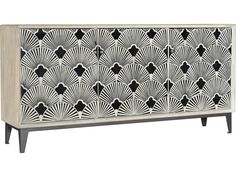 an art deco cabinet with black and white designs