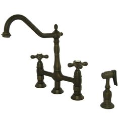 an antique style faucet with three handles and two sprayers on each side