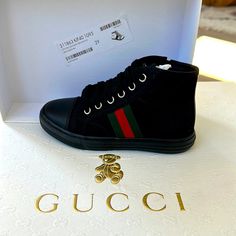 Gucci Black High Top Sneakers - Euro 29 New/Never Worn/With Tags/Authentic Black Sporty Gucci High-top Sneakers, Designer Black Gucci High-top Sneakers, Gucci Black Lace-up High-top Sneakers, Luxury Black Gucci High-top Sneakers, Gucci Black Sporty Sneakers, Casual Gucci High-top Sneakers With Round Toe, Sporty Black Gucci Sneakers, Gucci Black Lace-up Sneakers, Black Gucci Lace-up Sneakers