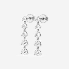 Graduate to a higher level of sophistication with these graduated lab grown diamond dangle earrings. Sparkling round diamonds are set in prong setting and hung delicately with tiny loops to give them fluidity and movement. Classic Diamond Accents Linear Drop Earrings, Classic Linear Earrings With Diamond Accents In Diamond White, Classic Diamond White Linear Earrings For Formal Occasions, Classic Diamond White Linear Earrings For Formal Events, Classic Diamond White Linear Earrings, Classic Diamond White Linear Drop Earrings, Classic Formal Linear Earrings In Diamond White, Classic Prong Setting Dangle Linear Earrings, Classic Diamond White Linear Earrings For Anniversary