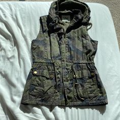 Never Worn- In Great Condition. Khaki Hiking Vest For Fall, Khaki Vest For Hiking In Fall, Black Outerwear For Fall Camping, Military Style Outdoor Vest For Fall, Military Style Vest For Outdoor Fall Activities, Military Vest For Outdoor Activities In Fall, Outdoor Military Vest For Fall, Military Vest For Fall Outdoor Activities, Fall Outdoor Military Vest