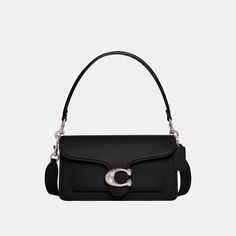 A modern take on an archival 1970s Coach design our structured Tabby shoulder bag is crafted of polished pebble leather. Finished with our Signature hardware for an iconic touch the compact 26 features two detachable straps to carry by hand style as a short shoulder bag or wear crossbody. | Coach Tabby Shoulder Bag 26 - Women's - Silver/black Evening Flap Bag With Palladium Hardware, Classic Flap Bag With Silver-tone Hardware And Top Handle, Classic Rectangular Saddle Bag For Evening, Classic Flap Bag With Silver-tone Hardware For Everyday Use, Classic Flap Shoulder Bag With Palladium Hardware, Classic Saddle Crossbody Bag With Silver-tone Hardware, Classic Crossbody Saddle Bag With Silver-tone Hardware, Classic Everyday Flap Bag With Silver-tone Hardware, Modern Coach Satchel With Gold-tone Hardware