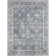 a blue and white rug with an ornate design on the bottom, in front of a white background