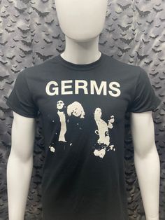 The Germs T-shirt Germs on a black tee 100% Cotton Sizes available Small-->2XL These are handmade screenprinted and slightly vary from the photo. Please feel free to email me any questions. Thanks for looking. Due to an influx of incorrect addresses if a package is returned, you must pay the shipping cost to resend the item to you. I do not do exchanges and I do not take returns unless the item is damaged. I thoroughly check each item before it is shipped out. The seller is not responsible fo Grunge Custom Print T-shirt For Concert, Alternative Crew Neck T-shirt With Screen Print, Alternative Style Crew Neck T-shirt With Screen Print, Punk Style Custom Print Short Sleeve T-shirt, Custom Print Black T-shirt For Concert, Black Custom Print T-shirt For Concert, Unisex Alternative Style T-shirt With Screen Print, Band Merch T-shirt With Screen Print For Alternative Fashion, Darby Crash