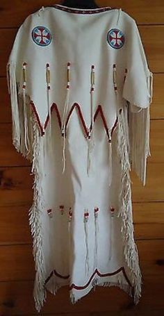 Handmade Read the full description Materials: Handmade, Suede leather, wedding dress, beads Women Handmade cow hide leather  Native American Dress, Plains Indian White Colors with Bones style, with glass beads 100 % Genuine Top Quality Soft Leather With Fringes Handmade Beadwork Item specifics Condition: New with tags: A brand-new, unused, and unworn item (including handmade items) in the original packaging (such as the original box or bag) and/or with the original tags attached. Accents: Beaded Buckskin Dress, American Indian Clothing, Native American Wedding, Native American Dress, Powwow Regalia, Wedding Dress Size 10, Native American Regalia, Native Dress, Native American Clothing