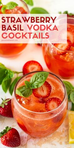 strawberry basil vodka cocktail in a glass with mint garnish