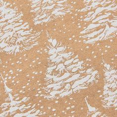 a brown and white background with pine trees in the snow on it's surface