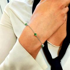 Our Emerald May Birthstone Minimalist Silver Bracelet beautifully captures the essence of emerald, symbolizing rebirth, love, and wisdom for those born in May.  With its sleek silver design and vibrant green gemstone, this bracelet makes a thoughtful and elegant gift for celebrating May birthdays.  Perfect for everyday wear or special occasions, it's a meaningful way to honour and cherish those who embrace the energy of their May birthstone. Crafted from high-quality 18ct gold vermeil and featur Emerald Bracelets For May Birthstone, Green Emerald Bracelet For May Birthstone, Modern Green Gemstone Bracelets, Minimalist Green Bracelet, Luxury Green Bracelet For May Birthstone, Luxury Green Bracelets For May Birthstone, Green Gemstone Bracelet Fine Jewelry, Green Minimalist Bracelet With Jubilee Design, Green Round Birthstone Bracelet