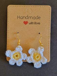 The hypoallergenic hook is made of 925 silver-plated copper. Hook color may vary. The earring backs are made of clear silicone. Attached is a crochet flower made out of crochet thread.  Thank you for looking  *Items are made in a pet friendly home* **pattern by Jada-institches** Cute Handmade Flower-shaped Earrings, Handmade White Earrings For Everyday, White Handmade Earrings For Everyday Wear, Handmade Small Adjustable Earrings, Handmade Adjustable Small Earrings, Handmade White Flower Earrings For Everyday, Crochet Flower-shaped Earrings For Gift, Handmade Flower Earrings For Crafting, Handmade White Dangle Flower Earrings