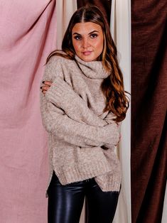 Our In Session Turtleneck Sweater is a must this season! This gorgeous taupe sweater is made from a soft, cozy and stretchy knit fabrication, and features a longer length and long sleeves to keep you warm all season long. Dress it up with jeans and booties for a stylish look, or pair it with leggings and sneakers for a casual-cool outfit. Whatever your style, this sweater is sure to become one of your favorites this season! Color: Taupe Relaxed Fit Ribbed Hemline + Cuffs Turtleneck Long Sleeves Oversized Cozy Taupe Sweater, Oversized Taupe Sweater For Fall, Cozy Taupe Sweater For Layering, Oversized Taupe Sweater For Winter, Beige Fall Sweater For Layering, Casual Taupe Sweater For Fall, Brown Long Sleeve Turtleneck For Fall, Cream Long Sleeve Sweater For Fall, Taupe Soft Knit Sweater