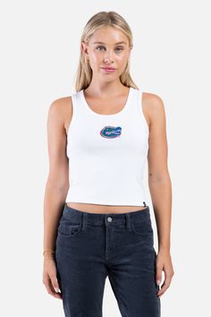 The MVP Tank! A ribbed tank top with an embroidery finish – one of our bestsellers! Perfect to throw on with your favorite jeans and sneakers. SIZING AND DETAILS Sizing: XS-XXL Fit adjusts to every body type Falls at the hips 95% Supima Cotton Rib, 5% Spandex Embroidered logo application P.S. We’d love to see you repping this style! Make sure to tag us (@hypeandvice) to be featured :) Fitted Casual Tank Top For Streetwear, Casual Ribbed Tops For Streetwear, Casual Ribbed Tank Top For Streetwear, Casual Racerback Tank Top For Streetwear, Casual Cotton Ribbed Tank Top, Casual Ribbed Cotton Tank Top, Basic Racerback Top For Streetwear, Sportswear Outfits, College Gear