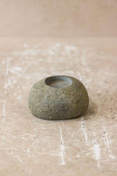 a small stone sitting on top of a table