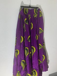 African print maxi length skirt  -has pockets Purple Long Skirt For Vacation, Vacation Gathered Maxi Skirt, Casual Maxi Dress With Elastic Waistband, Casual Printed Relaxed Maxi Skirt, Casual Long Printed Skirt, Bohemian Wide Leg Maxi Skirt With Pockets, Purple Flowy Maxi Skirt For Vacation, Vacation Pleated Flared Maxi Skirt, Long Pleated Vacation Dress