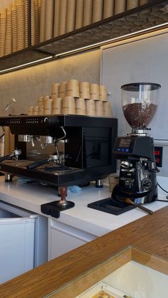 a coffee machine sitting on top of a counter