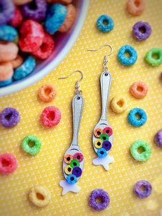 "The Spoon Full of Cereal Earrings features silver chrome, pink, blue, purple, green, orange, yellow, and white acrylics with engraved details. The earrings closure is sterling silver. All my designs are digitally created, laser cut, and then hand assembled.  Measurements: Length: 3\" Width: 1/2\" Please keep in mind that all earrings are made to order and processing time can be from 7-10 days, sometimes less depending on the workload.  Instagram: SunshineFunshop Follow my account for fun behind Cereal Earrings, Chrome Pink, Crazy Earrings, Interesting Images, Modern Tattoos, Funky Earrings, Silver Chrome, Clay Jewelry Diy, Funky Jewelry