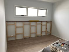 the room is being remodeled and ready to be used as a storage area for books