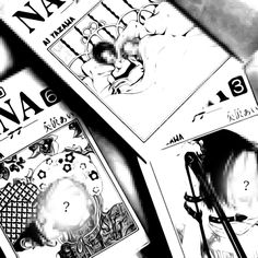 three playing cards are laying next to each other on the ground, with one being drawn in black and white