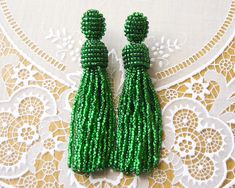 Long Green beaded tassel earrings Short Clip beaded earrings Oscar de la Renta earrings Seed bead Green earrings Statement Celebrity jewelry Statement earrings celebrity jewelry Emerald accessory Elegant and beautiful long beaded tassel stud earrings - new brand in fashion jewelry 2016. These earrings made of Czech beads . This collection was inspired by designer Oscar De La Renta. These earrings are perfect for the creation of evening and daily image. They are very light weight. By your order, earrings can be made other colors and lengths. Please, write about it in the personal massage. Please note that due to lighting effects, monitor's brightness, contrast and other parameters of the photo may be slight differences in the colors on this product. The order is sent in a beautiful gift box Elegant Green Earrings With Beaded Fringe, Elegant Green Beaded Fringe Tassel Earrings, Elegant Green Beaded Earrings With Tassels, Elegant Beaded Tassel Earrings Gift, Handmade Green Tassel Earrings For Party, Beaded Tassel Earrings With Round Beads For Parties, Elegant Green Beaded Tassel Earrings, Elegant Green Tassel Earrings With Round Beads, Party Tassel Earrings With Round Beads