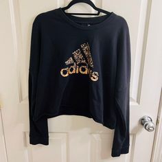 Nwot Cozy Black Cropped Sweatshirt With Adidas Logo Adidas Tops With Graphic Print For Fall, Oversized Adidas Sweatshirt With Long Sleeves, Oversized Long Sleeve Adidas Sweatshirt, Adidas Oversized Crew Neck Top, Adidas Black Sweatshirt For Fall, Oversized Adidas Crew Neck Top, Adidas Fall Streetwear Top, Adidas Graphic Print Tops For Winter, Adidas Casual Tops For Fall